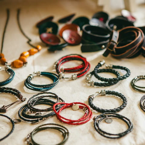 Leather and steel bracelets.